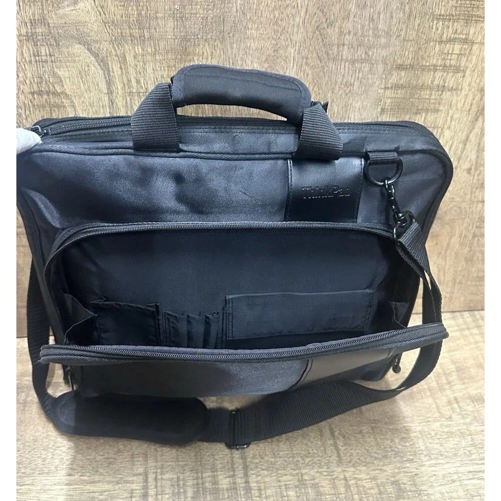 ThinkPad black computer bag with multiple compartments and pockets 16x13 Inches